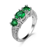 Timeless Ring with Brilliant Stones in Emerald Style