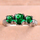 Timeless Ring with Brilliant Stones in Emerald Style