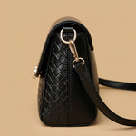 Shoulder Bag with Floral Clasp