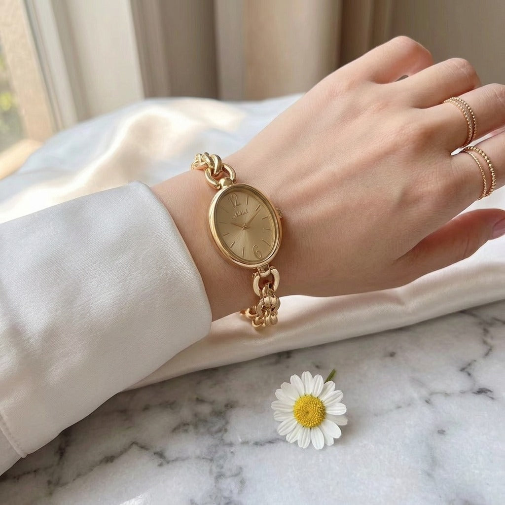 Lady's Steel Strap Watch Gold Oval Hollow Chain Quartz Watch